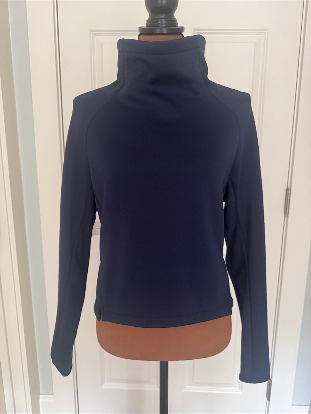 Nike Dri-Fit crop funnel neck top.  Dark navy w/black.  Size M